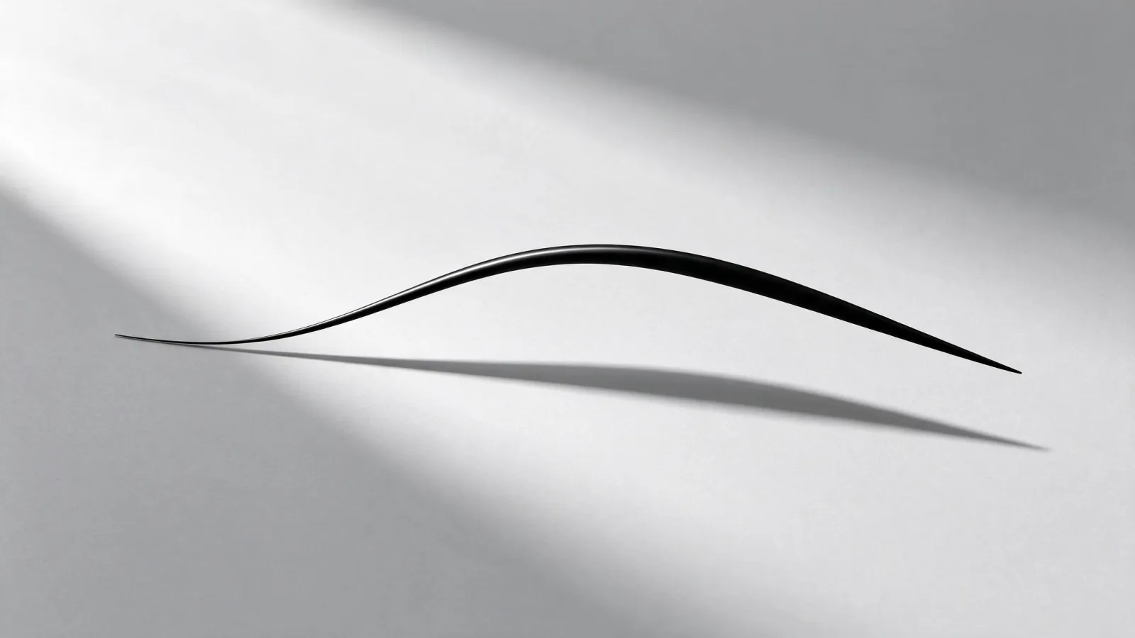 Ảnh minh hoạ Width Tool (Illustrator): một đường cong vector với các điểm chỉnh độ rộng và kết quả nét thon hai đầu